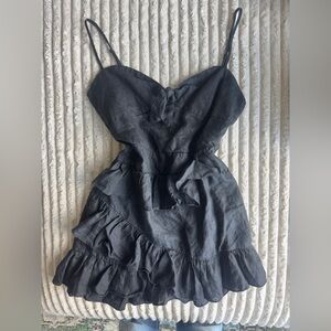 The Impeccable Pig Black Ruffled Tiered Mini Dress